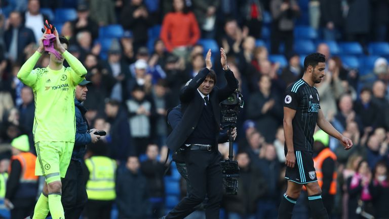 LONDON, ENGLAND - DECEMBER 11:  Antonio Conte (C), Manager of Chelsea applauds supporters after the Premier League match between Chelsea and West Bromwich 