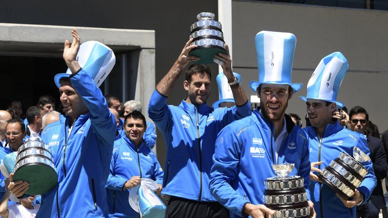 Argentina's players (L-R) Federico Delbonis, Juan Martin Del Potro, Leonardo Mayer and Guido Pella, celebrate after clinching a first Davis Cup