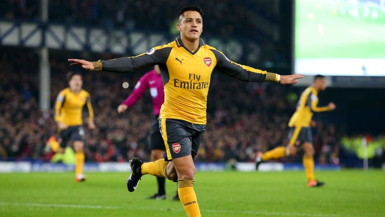 LIVERPOOL, ENGLAND - DECEMBER 13:  Alexis Sanchez of Arsenal celebrates after scoring the opening goal during the Premier League match between Everton and 