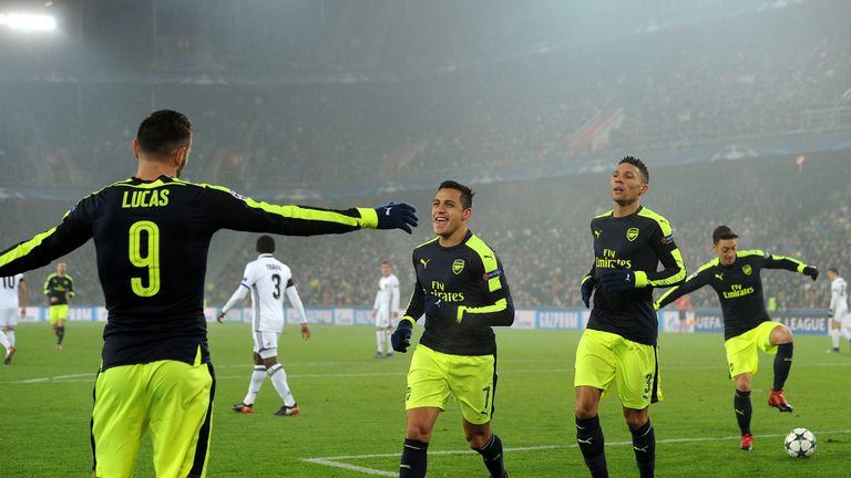 Lucas Perez celebrates his second goal of the game against Basel