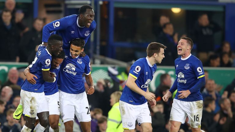 LIVERPOOL, ENGLAND - DECEMBER 13:  Ashley Williams #5 (2nd L) of Everton is congratulated by teammates after scoring his teams second goal during the Premi