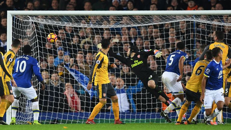 Everton's English-born Welsh defender Ashley Williams (3R) scores his team's second goal during the English Premier League football match between Everton a