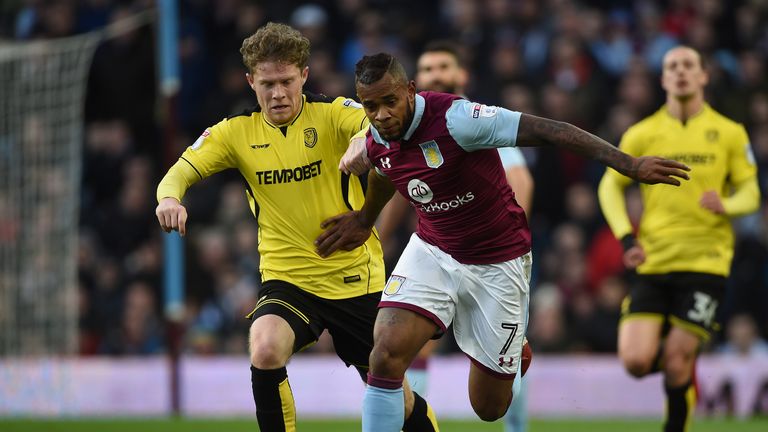 Aston Villa's Leandro Bacuna and Burton Albion's Matty Palmer battle for the ball