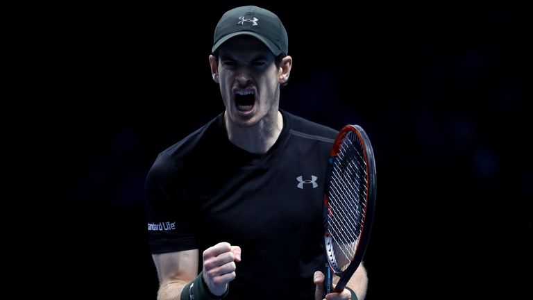 Andy Murray celebrates scoring a point during his men's singles semi final against Milos Raonic