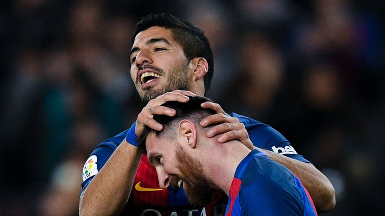 BARCELONA, SPAIN - DECEMBER 18:  Luis Suarez of FC Barcelona celebrates with his team mate Lionel Messi after scoring his team's second goal during the La 
