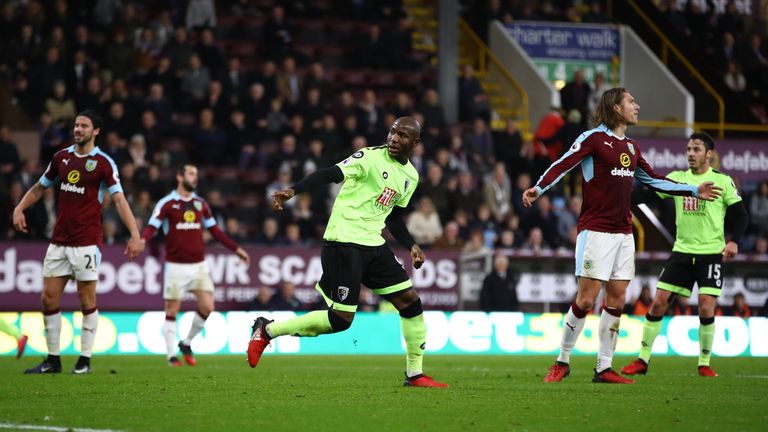 BURNLEY, ENGLAND - DECEMBER 10:  Benik Afobe of AFC Bournemouth (R) celebrates scoring his sides first goal during the Premier League match between Burnley