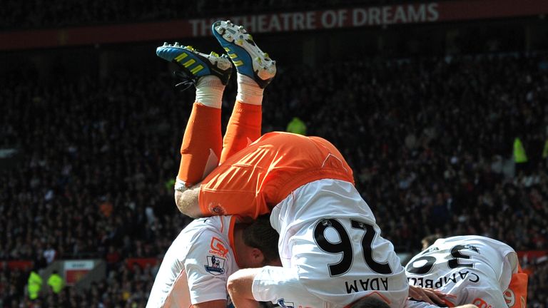 Blackpool players celebrate Gary Taylor-Fletcher's goal during the English Premier League football match