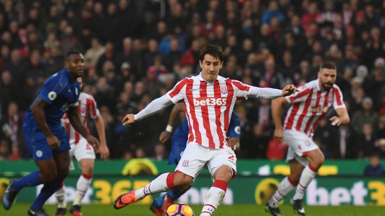 STOKE ON TRENT, ENGLAND - DECEMBER 17:  Bojan Krkic of Stoke City scores his sides first goal from the penalty spot during the Premier League 