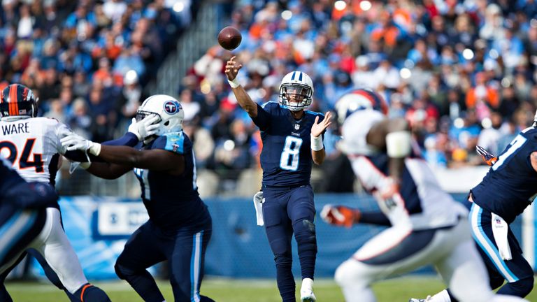 Marcus Mariota #8 of the Tennessee Titans throws a pass in the first half during a game against the Denver Broncos