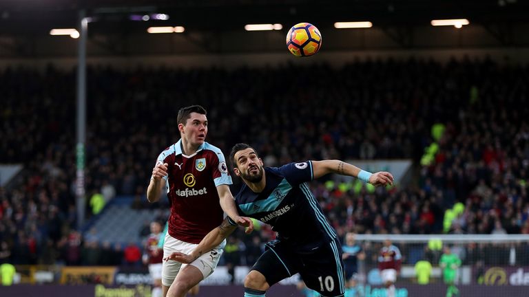 BURNLEY, ENGLAND - DECEMBER 26:  Alvaro Negredo of Middlesbrough holds off pressure from Michael Keane of Burnley during the Premier League match between B