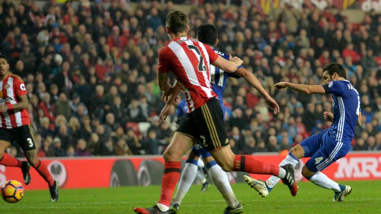 Chelsea's Cesc Fabregas scores his side's first goal during the Premier League match at the Stadium of Light, Sunderland.