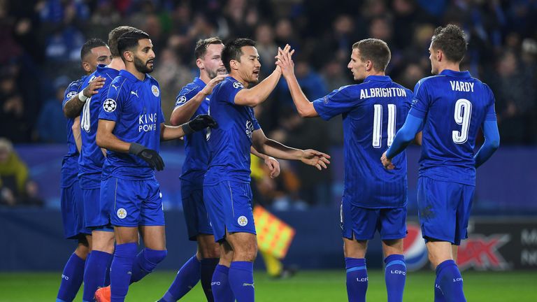Riyad Mahrez (3L) celebrates with team-mates after scoring Leicester's second goal against Club Brugge 
