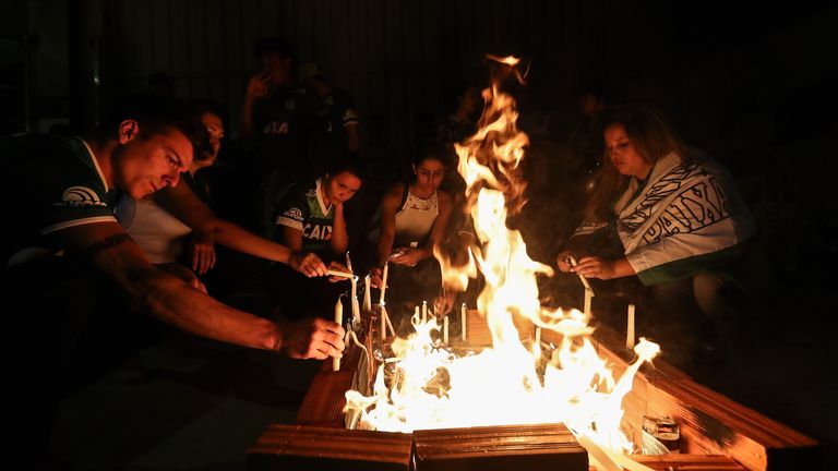 Some supporters lit candles in tribute to the Chapecoense players who died
