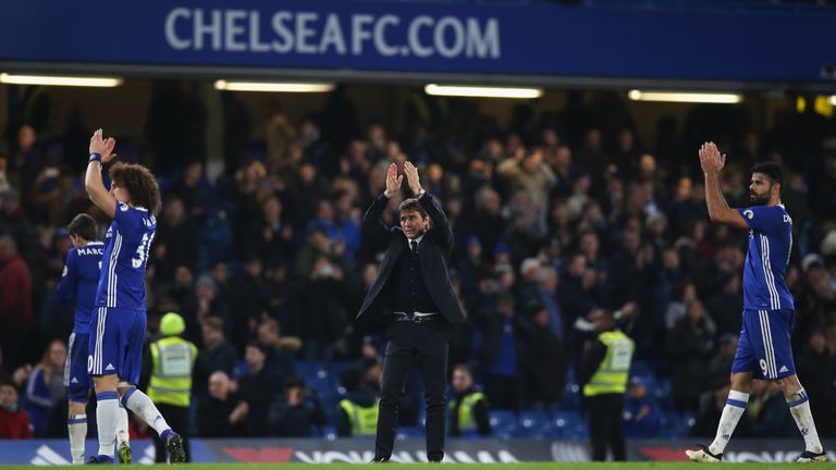 LONDON, ENGLAND - DECEMBER 31:  Antonio Conte (C), Manager of Chelsea applauds supporters after the Premier League match between Chelsea and Stoke City at 