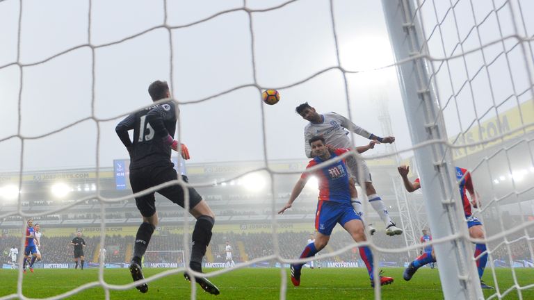 Diego Costa of Chelsea (R) scores his side's first goal against Crystal Palace
