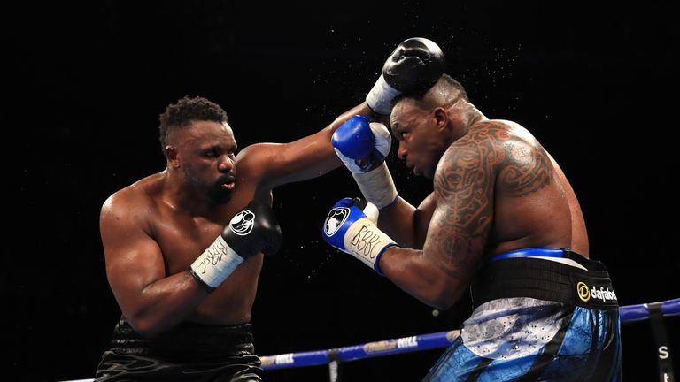 MANCHESTER, ENGLAND - DECEMBER 10:  Dillian Whyte (R) of Brixton in action against Dereck Chisora of Finchley during their WBC World Heavyweight Title Elim
