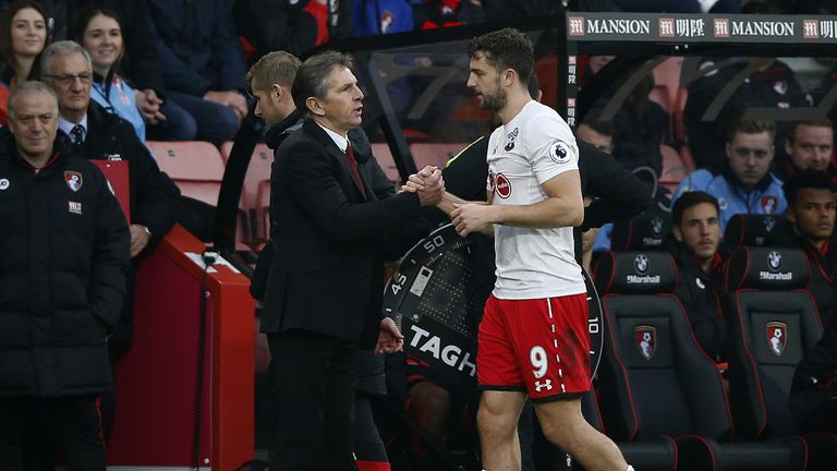 Southampton's French manager Claude Puel (L) congratulates Southampton's English striker Jay Rodriguez following the English Premier League football match 