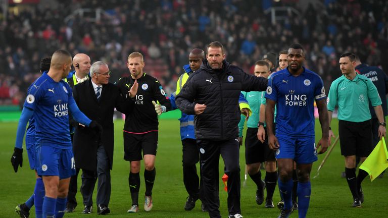 STOKE ON TRENT, ENGLAND - DECEMBER 17: Claudio Ranieri, Manager of Leicester City (L) speaks to referee Craig Pawson as he walks off for half time