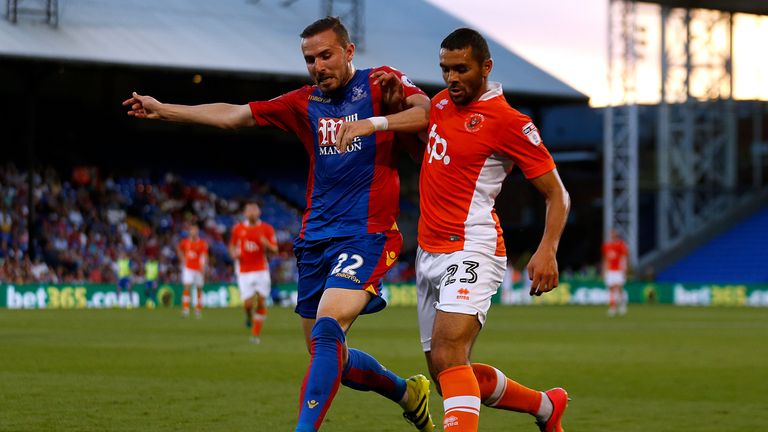 Crystal Palace's Jordon Mutch (left) and Blackpool's Colin Daniel battle for the ball during the EFL Cup, Second Round match at Selhurst Park, London.