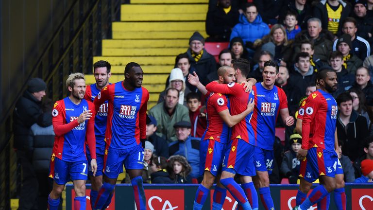 WATFORD, ENGLAND - DECEMBER 26:  Yohan Cabaye of Crystal Palace celebrates with team-mates  after scoring the opening goal during the Premier League match 