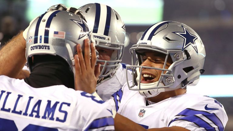 Dak Prescott celebrates with Terrance Williams after scoring a 31 yard touchdown