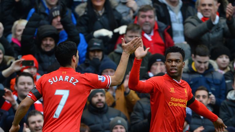 LIVERPOOL, ENGLAND - FEBRUARY 08:  Daniel Sturridge of Liverpool celebrates scoring the fourth goal with team-mate Luis Suarez during the Barclays Premier 