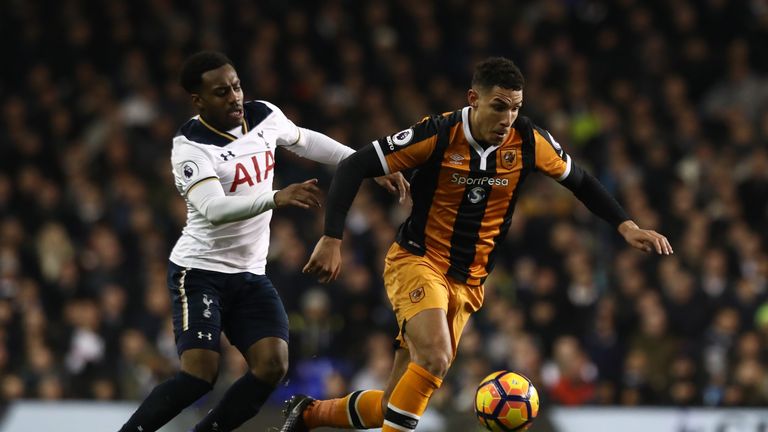 LONDON, ENGLAND - DECEMBER 14: Jake Livermore of Hull City and Danny Rose of Tottenham Hotspur compete for the ball during the Premier League match between