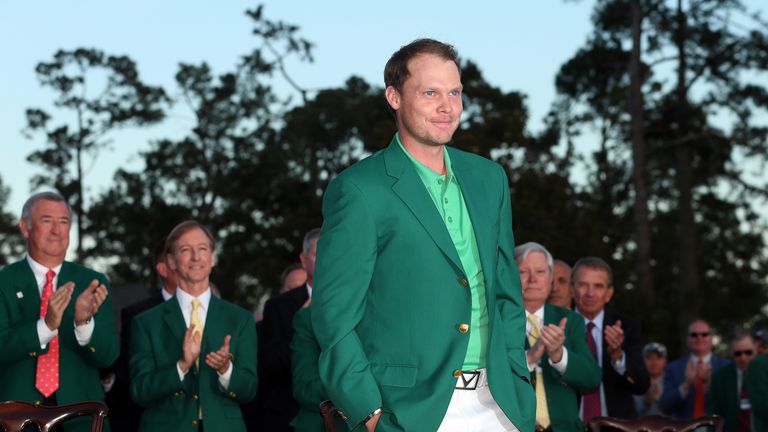 Danny Willett celebrates with the green jacket after winning the 2016 Masters in Augusta