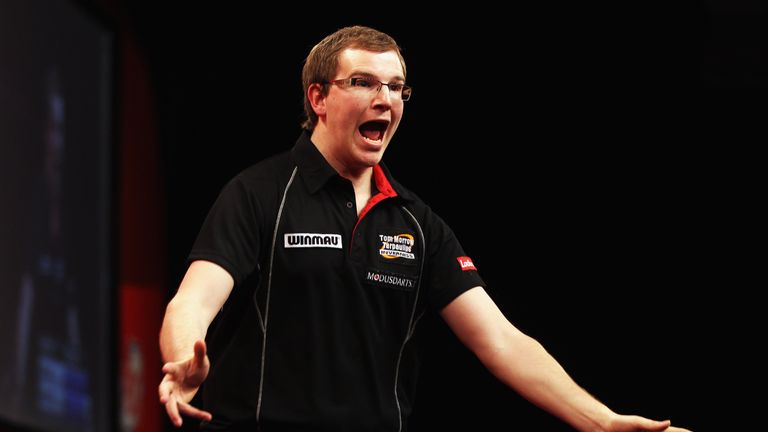 Mark Webster of Wales celebrates beating Phil Taylor of England during the quarter-finals