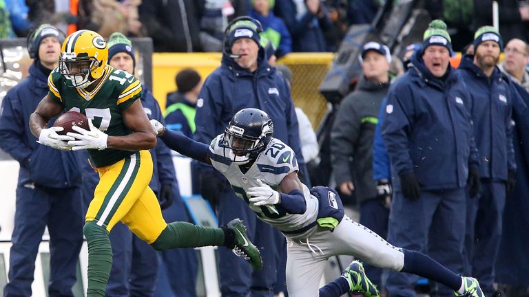 GREEN BAY, WI - DECEMBER 11:  Davante Adams #17 of the Green Bay Packers catches a pass for a touchdown during the game against the Seattle Seahawks at Lam