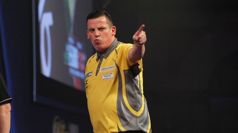 Dave Chisnall is into the World Championship last 16 after coming through a tough battle. Picture courtesy of Lawrence Lustig/PDC