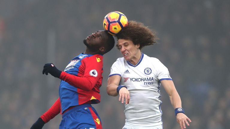 LONDON, ENGLAND - DECEMBER 17: Christian Benteke of Crystal Palace (L) and David Luiz of Chelsea (R) battle to win a header during the Premier League match