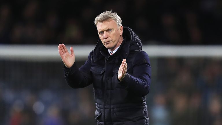 A despondent David Moyes applauds fans after the 4-1 loss to Burnley