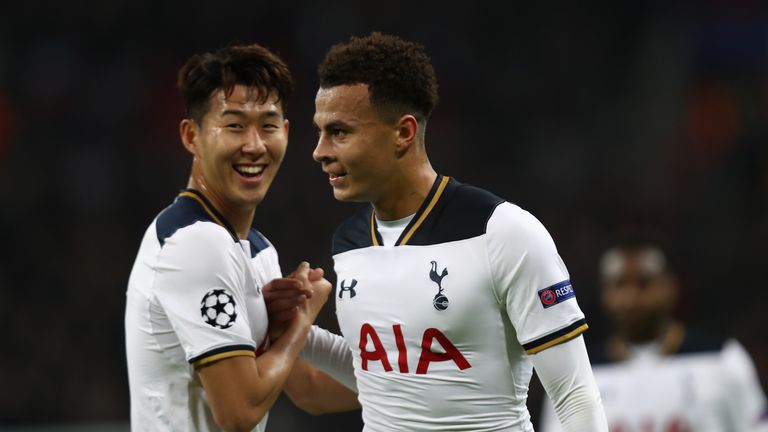 LONDON, ENGLAND - DECEMBER 07: Dele Alli of Tottenham Hotspur (R) celebrates scoring his sides first goal with Heung-Min Son of Tottenham Hotspur (L) durin