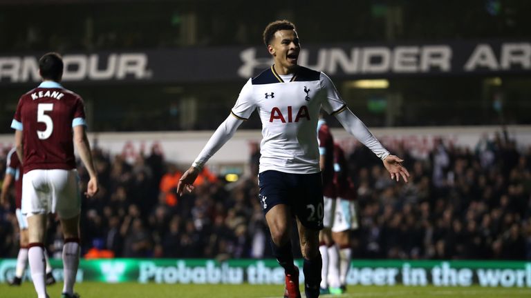 Dele Alli of Tottenham Hotspur celebrates scoring his sides first goal during the Premier League match between Tottenham and Burnley