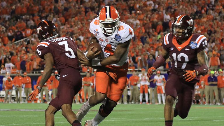ORLANDO, FL - DECEMBER 03:  Deshaun Watson #4 of the Clemson Tigers scores a touchdown the ACC Championship against the Virginia Tech Hokies on December 3,
