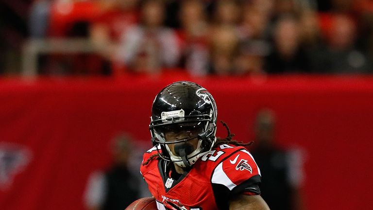 Devonta Freeman #24 of the Atlanta Falcons runs the ball during the first half against the Arizona Cardinals at the Georgia Dome