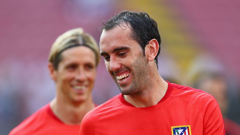 MILAN, ITALY - MAY 27: Diego Godin of Atletico Madrid smiles during an Atletico de Madrid training session on the eve of the UEFA Champions League Final ag