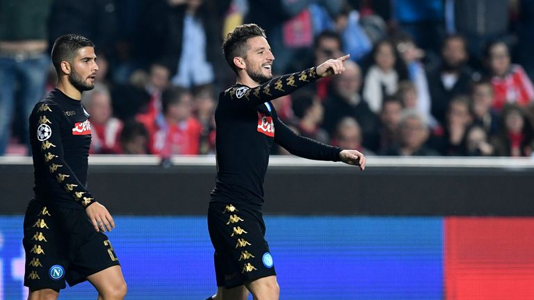 Napoli midfielder Dries Mertens (R) celebrates after scoring