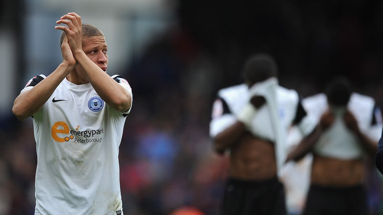 LONDON, ENGLAND - MAY 04:  Dwight Gayle of Peterborough looks dejected after they are relegated during the npower Championship match between Crystal Palace