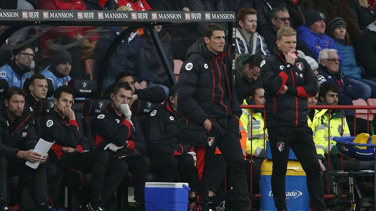 Eddie Howe (R) watches his players from the touchline during the Premier League football match between Bournemouth and Southampton