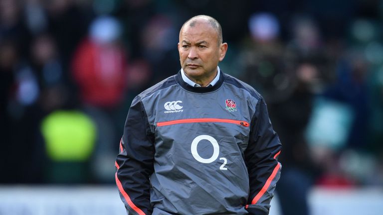 England's head coach Eddie Jones watches as his players warm up ahead of the international rugby union test match between England and Australia at Twickenh