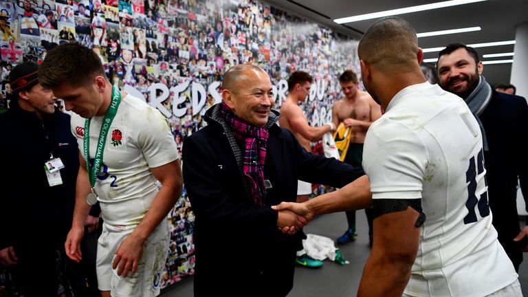 LONDON, ENGLAND - DECEMBER 03: Eddie Jones the England head coach (C) and Jonathan Joseph of England (R) shake hands during the Old Mutual Wealth Series ma