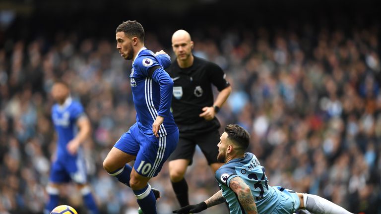 MANCHESTER, ENGLAND - DECEMBER 03: Eden Hazard of Chelsea goes past Nicolas Otamendi of Manchester City during the Premier League match between Manchester 