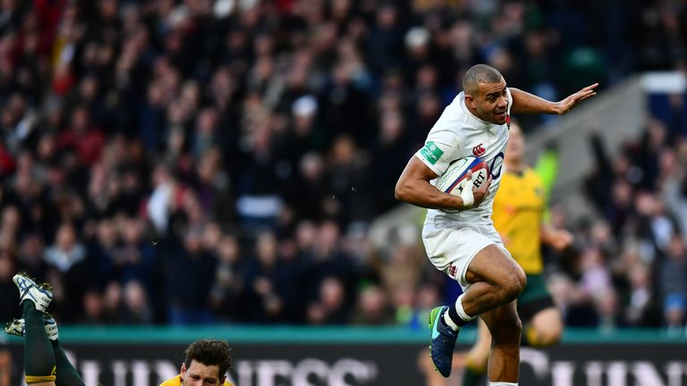 LONDON, ENGLAND - DECEMBER 03:  Jonathan Joseph of England (R) scores his sides first try while Bernard Foley of Australia (L) attempts to tackle him durin