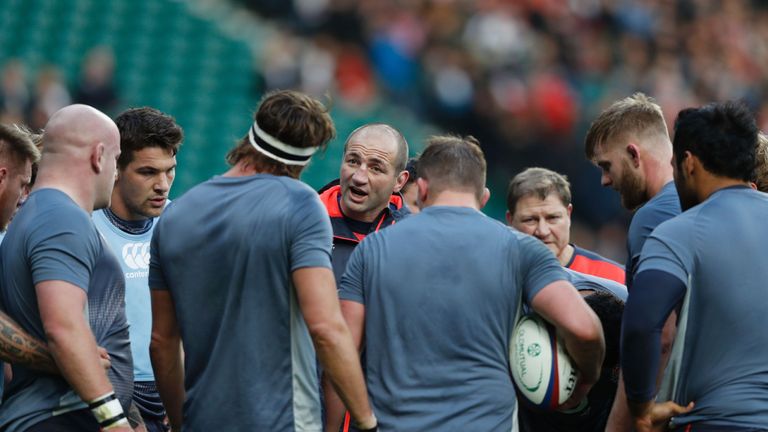 England assistant coach Steve Borthwick (C) talks with the players ahead of the international rugby union test match between England and Argentina at Twick