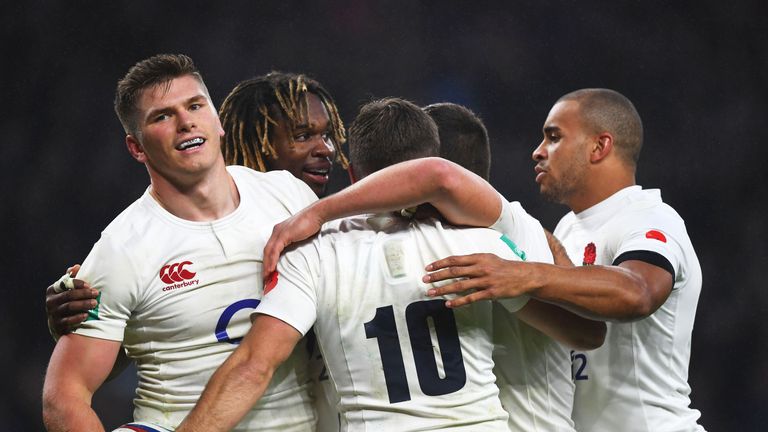 Owen Farrell celebrates scoring England's fourth try with his team-mates