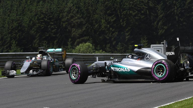 Lewis Hamilton passes the crashed Mercedes of his team-mate Nico Rosberg in Austria - Picture by Sutton Images