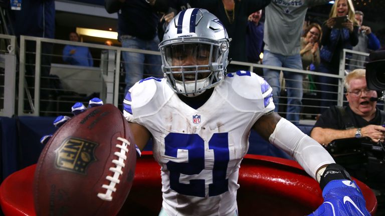 ARLINGTON, TX - DECEMBER 18:  Ezekiel Elliott #21 of the Dallas Cowboys celebrates after scoring a touchdown during the second quarter against the Tampa Ba