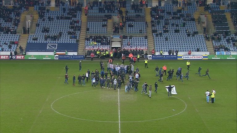 Coventry fans made their way onto the pitch to protest against owners Sisu
